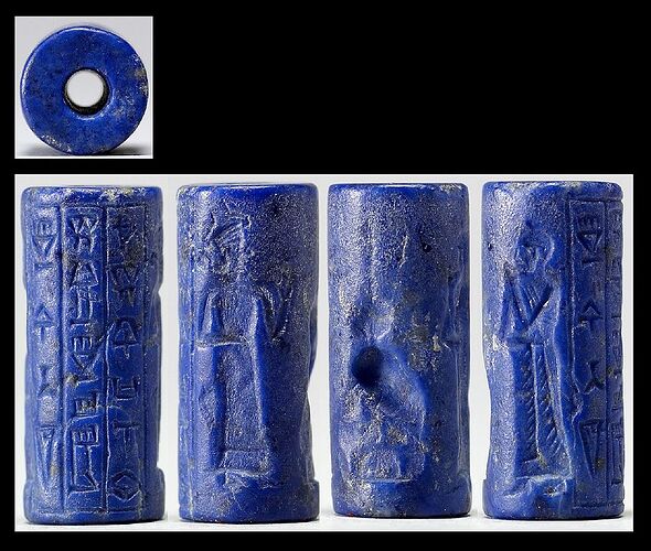 907px-Near_Eastern_-Cylinder_Seal_with_Standing_Figures_and_Inscriptions-Walters_42699-_View_A