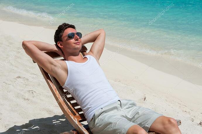 depositphotos_54788545-stock-photo-man-in-chair-sunbathing