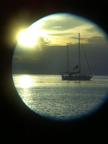 a_boat_through_a_telescope_by_smooty102_d96mdyn-fullview