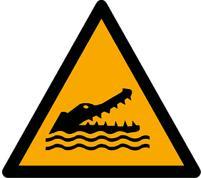 ISO_7010_W067_warning;_alligators,_caymans_and_crocodiles