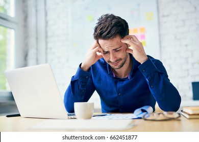 stressed-man-office-looking-on-260nw-662451877